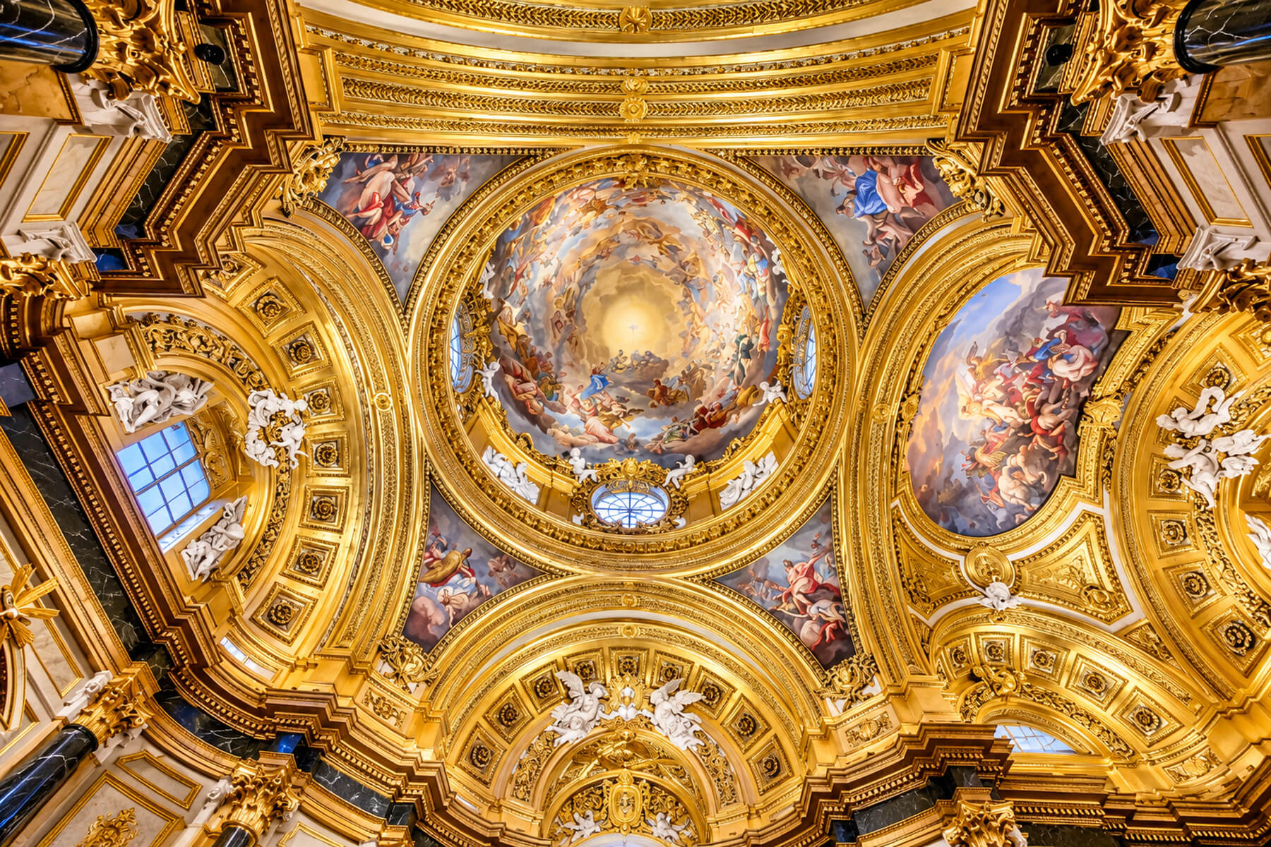 Gilded ceiling and frescoes in the Royal Chapel of Madrid’s Royal Palace