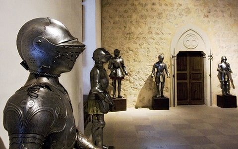 Historic armour displayed inside the Alcázar of Segovia
